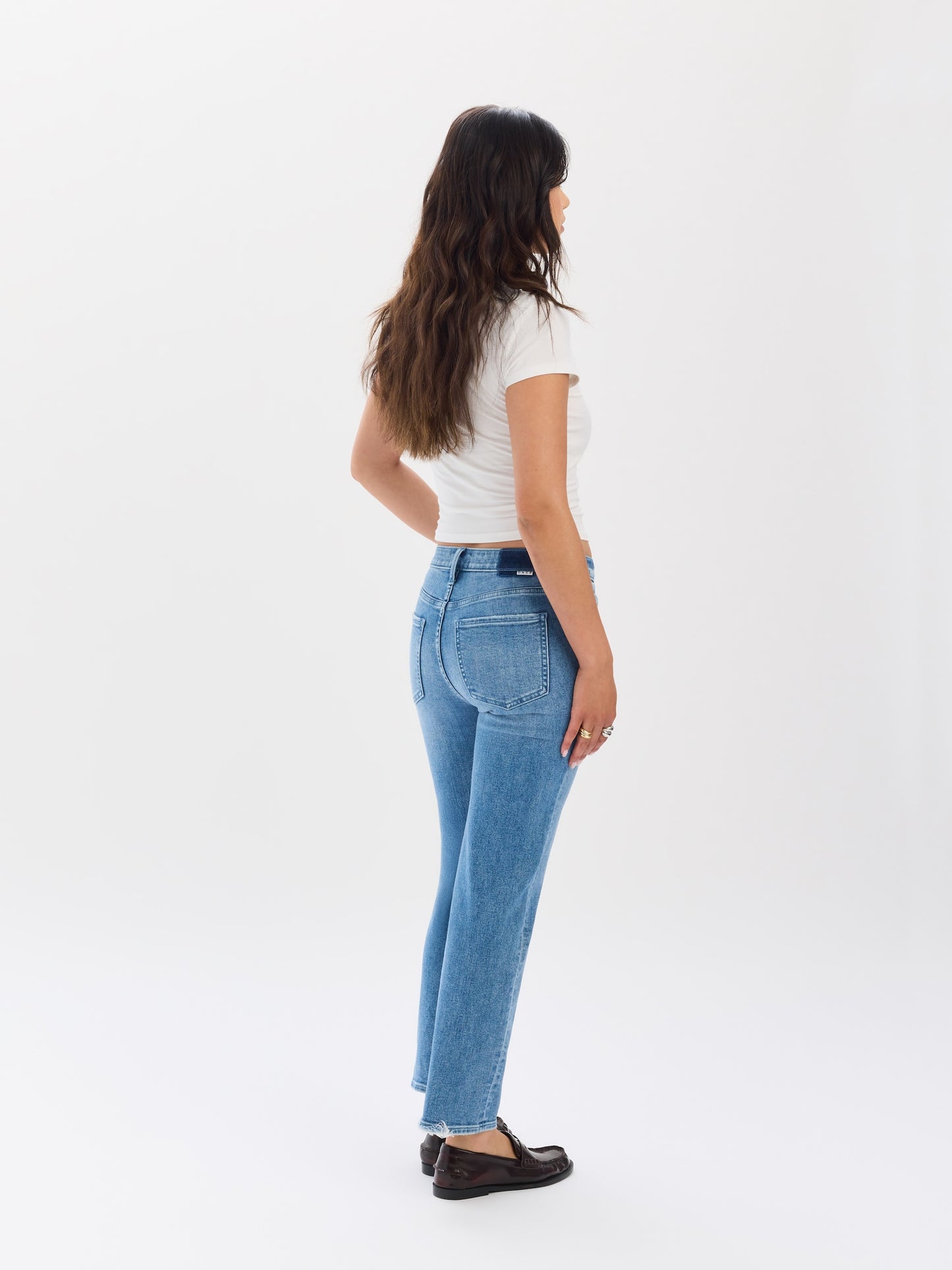 Rebel Mid Rise Slim Straight in Real Deal